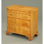 A walnut bachelors chest, second half 20th century,