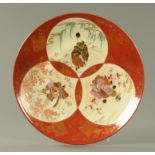 A late 19th century Japanese charger, decorated with figures including Samurai. Diameter 47 cm.