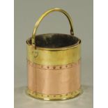 A 19th century brass and copper bucket, with loop handle and galvanised liner. Diameter 28.5 cm.