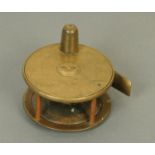 A vintage brass fly fishing reel, W.J. Cummins maker, Bishop Auckland. Diameter 3.25 ins.
