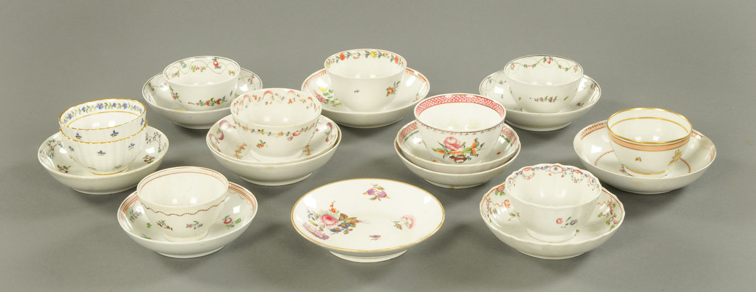 A collection of late 18th/early 19th century English porcelain tea bowls and saucers,