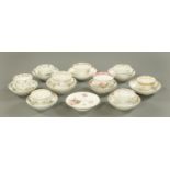 A collection of late 18th/early 19th century English porcelain tea bowls and saucers,