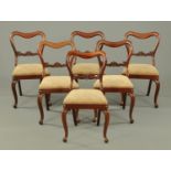 A set of six Victorian mahogany dining chairs,