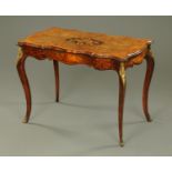 A Victorian walnut foliate marquetry shaped centre table,