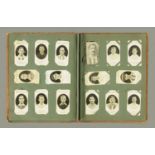 An early 20th century cigarette card album,