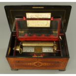 A late 19th century Swiss musical box, rosewood cased, large form, also with organ type mechanism,