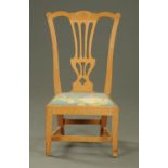 A light oak child's chair, in the Chippendale style,