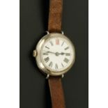 A rare trench style left handed wristwatch, early 20th century,