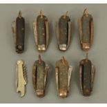 A collection of seven military penknives, and another marked "A. Hurlimann".