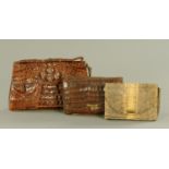 A ladies snake skin clutch purse, reptile skin purse and crocodile skin handbag,