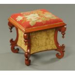 A Victorian mahogany upholstered stool and combined workbox, with scroll supports. Width 51 cm.