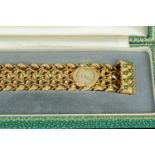 A ladies bracelet dress watch, unmarked but tested as 9 ct, the dial inscribed "Benedict",