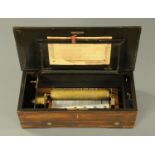 A Swiss music box, 19th century, playing six airs,