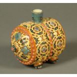 A Zsolnay Pecs reticulated barrel, early 20th century, decorated in blues,