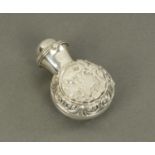 A silver cased smelling salts bottle, Birmingham circa 1900, date and maker marks rubbed. Height 5.