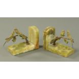 A pair of cold painted bronze and onyx book rests, early 20th century,