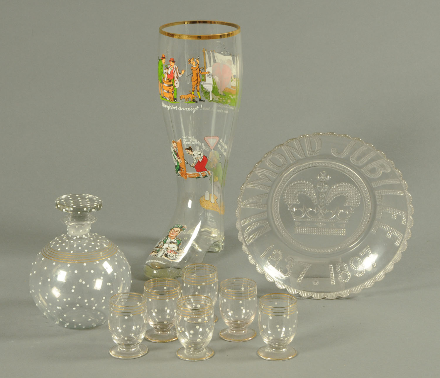 An Art Deco spot enamel decorated liqueur set,