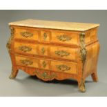 An early 20th century Continental walnut and specimen wood veneered commode,