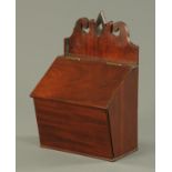 A Victorian mahogany candle box, with slope front. Width 26 cm.