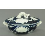 A large blue and white porcelain tureen and cover, early 19th century, oval slightly scalloped form,