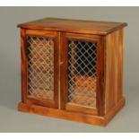 A handmade mahogany coin cabinet by Peter Nichols Cabinetmaker.