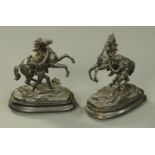 A pair of Victorian spelter Marley horses, each on wooden plinth. Height 30 cm.