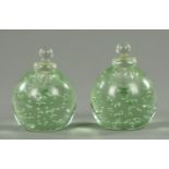 A pair of Victorian Wakefield green glass "dump" inkwell, 19th century, spherical form,