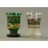 A Bohemian glass beaker, 19th century, decorated with a Continental landscape with castle,