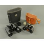 A pair of Hanimex binoculars, 16 x 50, a pair of United States Navy binoculars by Bausch & Lomb,