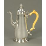 A George II coffee pot, hallmarked rubbed but probably London 1750, with ivory handle,