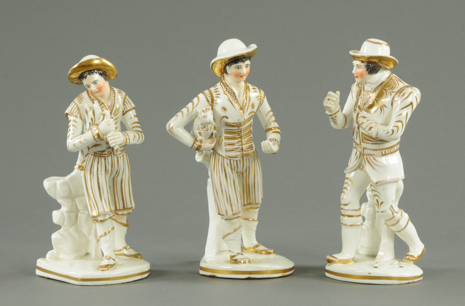 A set of three French figures, late 19th century, comprising a musician, farmer and gentleman,