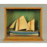 A scratch built model of the boat Stonehaven, No. A277, mounted in glazed display case. 31 cm x 37.
