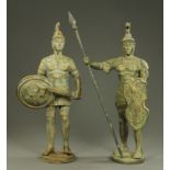 A pair of patinated cast iron Roman soldiers. Tallest 136 cm.