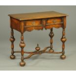 A reproduction oak side table, with moulded edge, two drawers,