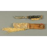 A sheath knife, probably Canadian. Length 23 cm.