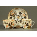 A English porcelain trio, early 19th century, comprising tea cup, coffee can and saucer,
