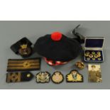 A military Tam O'Shanter, and naval insignia, buttons, etc.