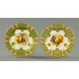A pair of Royal Worcester handpainted cabinet plates, date codes for 1919 and 1920, each signed "A.
