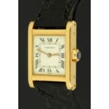 A ladies 18 ct gold cased Cartier Tank wristwatch, the white dial with Roman numerals,