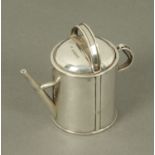 A silver novelty watering can, E.H.