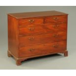 An early 19th century mahogany chest of drawers,