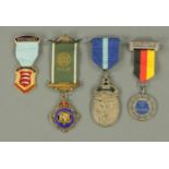 A silver and enamel RAOB Medal, and three other medals.