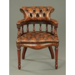 A Victorian style office armchair,