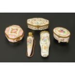Four French Limoges coffres, a French porcelain scent bottle, and a pomander,