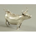 A German silver cow creamer, Hanau, importers marks for Berthold Muller 1907,