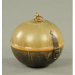 A Georgian horn tea caddy, globular form. Diameter 9.2 cm (see illustration).