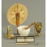 A brass eagle door knocker, a matchbox holder, Sorrento fan, abacus,