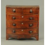An apprentice piece miniature mahogany bowfronted chest of drawers, early 19th century,