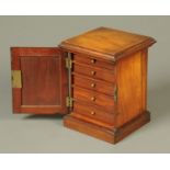 A small mahogany collectors' cabinet, circa 1900,