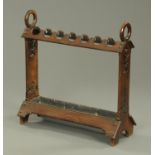 A late Victorian hall stick stand, with galvanised drip tray. Width 75 cm.